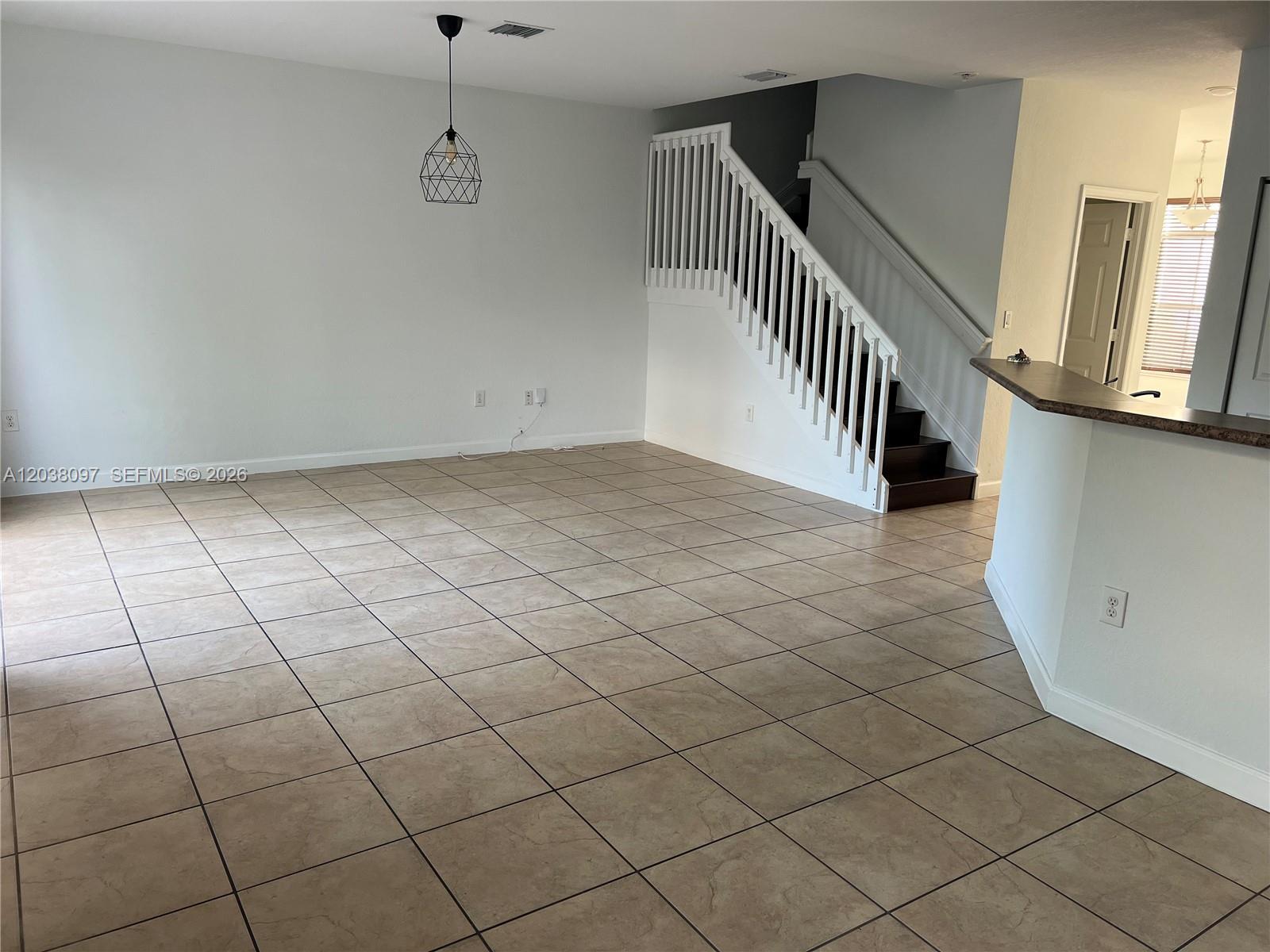 Coral Lakes Kingdom townhouse — open first floor layout with tile floors — 2555 SW 147th Path Miami FL 33185