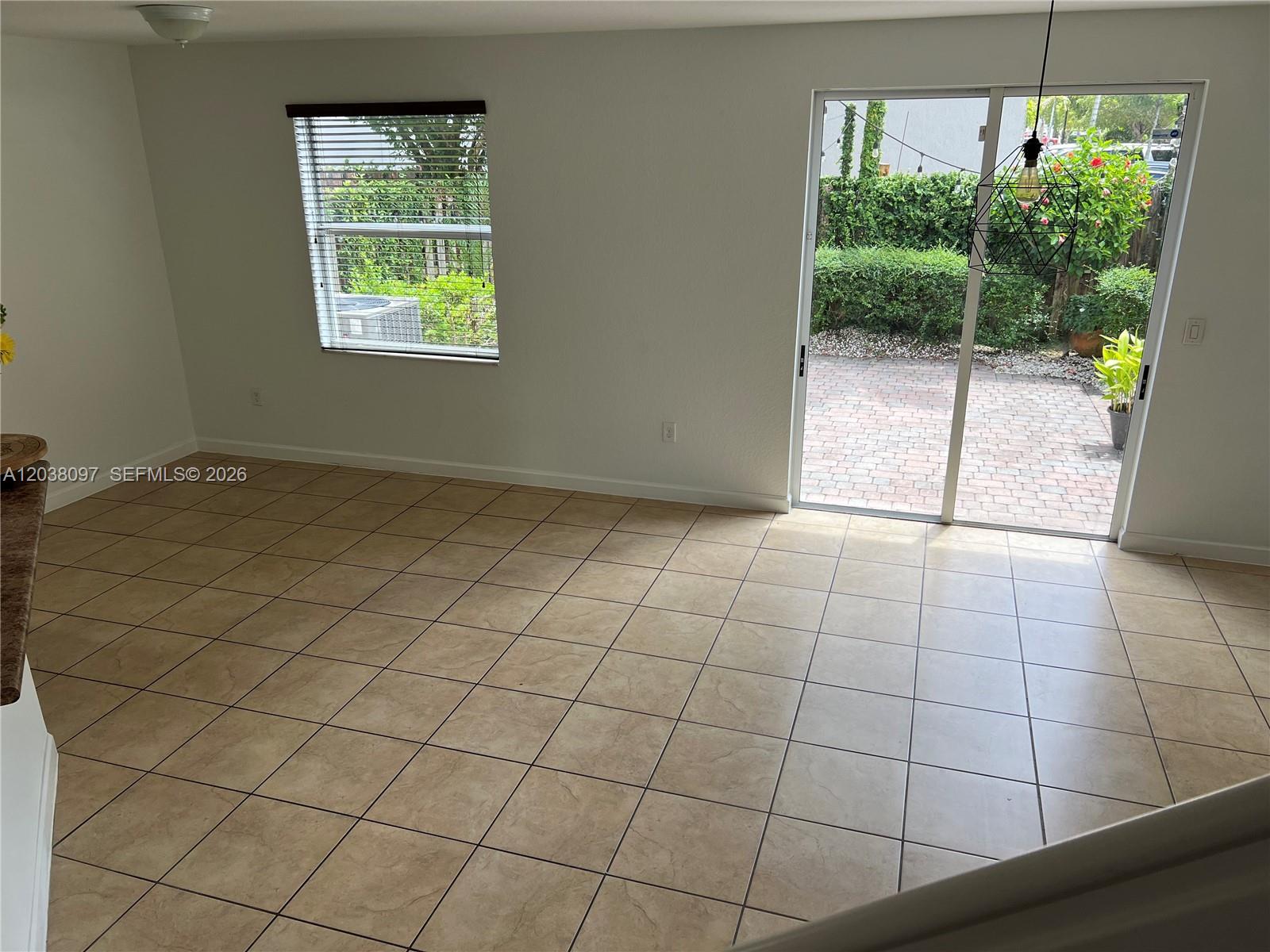 Coral Lakes Kingdom townhouse — living room with natural light — 2555 SW 147th Path Miami FL 33185
