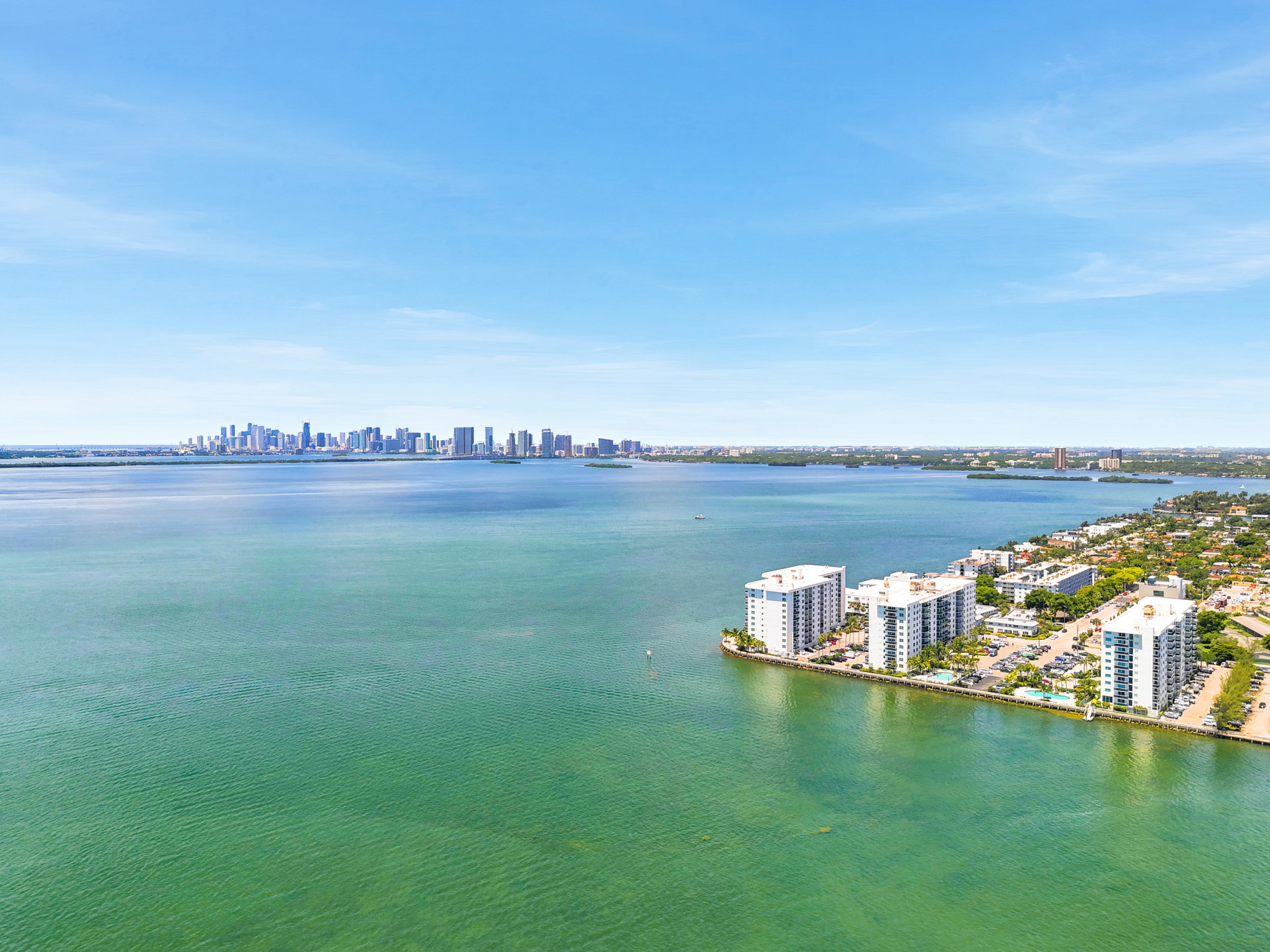 Treasures on the Bay II — open balcony with bay views — 7501 E Treasure Dr #2S North Bay Village FL