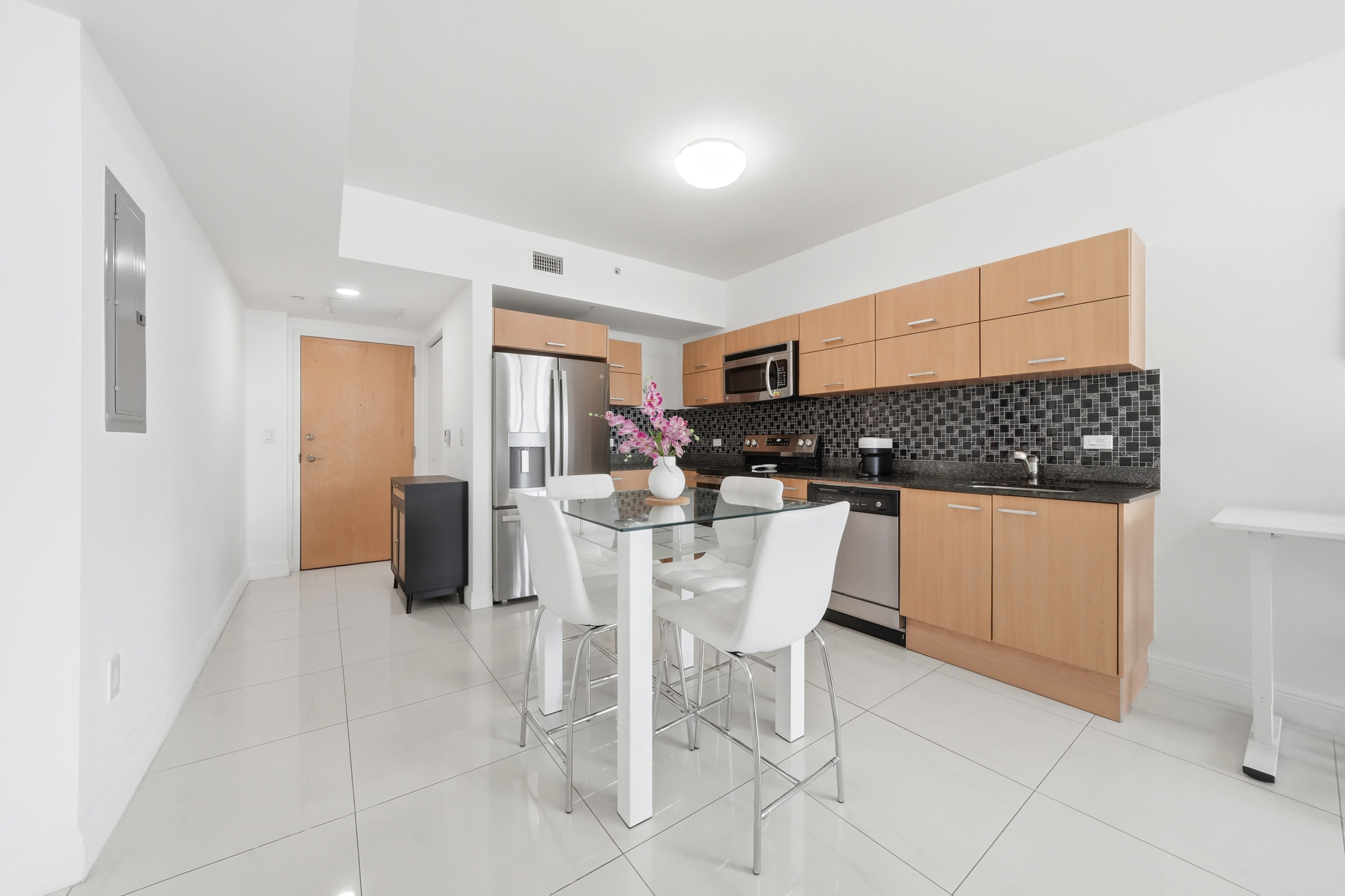 Kitchen with stainless steel appliances — 350 S Miami Ave #3912