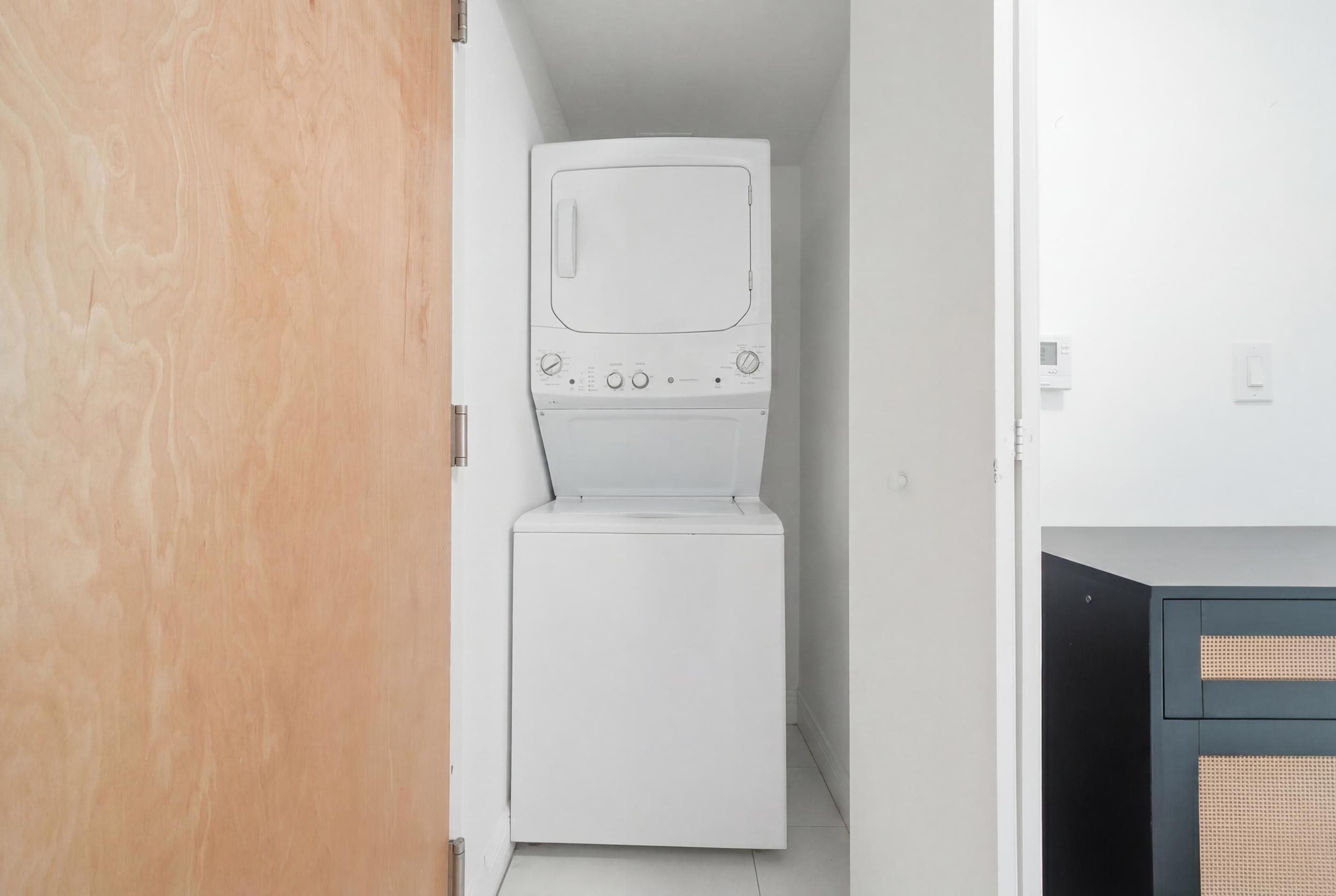 In-unit washer/dryer — Wind Condo 350 S Miami Ave